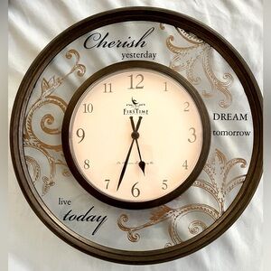 Lovely wall clock with message: “Cherish yesterday, dream tomorrow, live today “